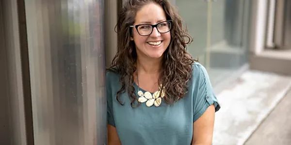Tiffany Root MA, LMHC, a Washington State therapist specializing in wellness programs and resiliencet