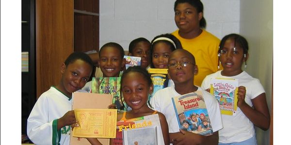 Back 2 Basics Summer Program - Kids taking time to read