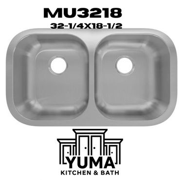 Double stainless steel kitchen sink with Yuma Kitchen & Bath logo.