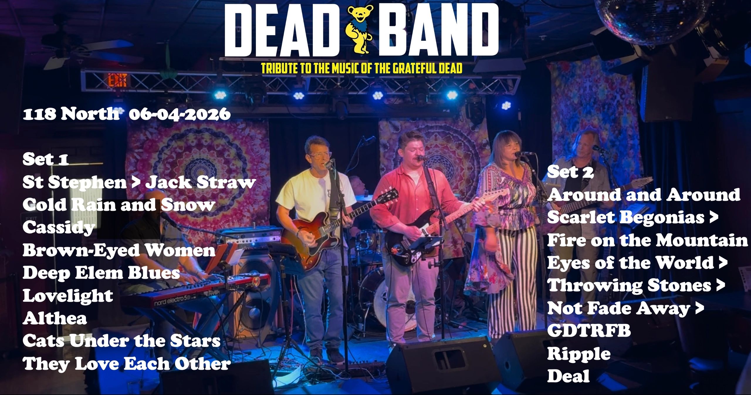 Dead Band tribute band performing with setlist displayed on stage.