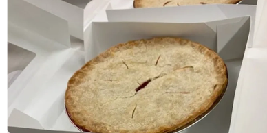 A freshly baked pie with a golden crust.