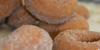Close-up of sugar-coated donuts.