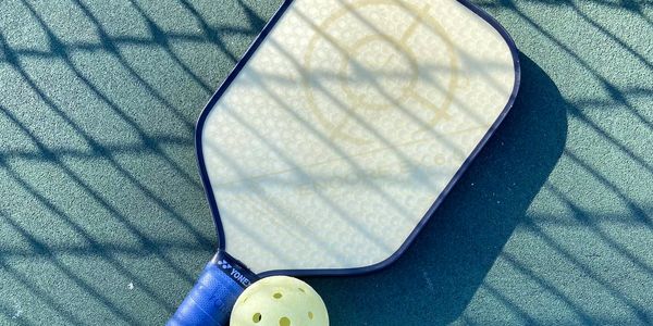 Pickleball paddle and ball