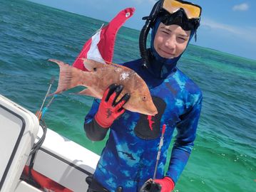 Young Carlo here capturing his first Hogfish.