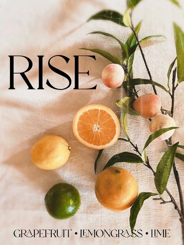 Citrus fruits and the word 'RISE' on a cloth.