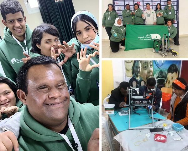 Youth team in green hoodies showcasing robotics and teamwork.