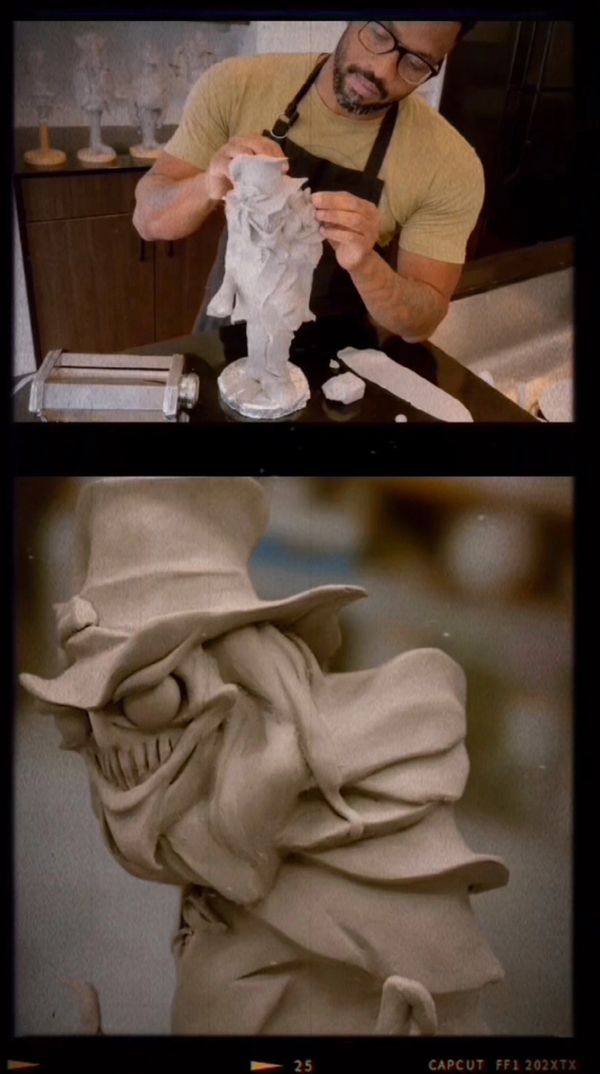Artist sculpts a detailed, eerie clay figure with a top hat and exaggerated features.