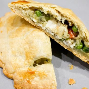 Wild Turkey Confit Hand Pie
Corn-masa and buckwheat pastry, turkey confit, caramelized onion, spruce