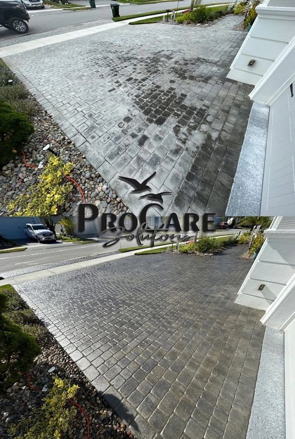 Before and after paver restoration and sealing in Plantation Bay, Ormond Beach, FL.
