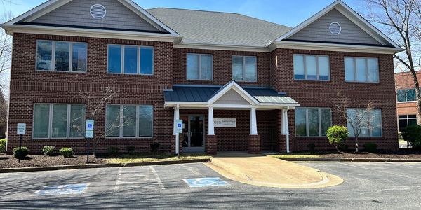 Exterior view of HealthFocus Acupuncture office building and parking lot.