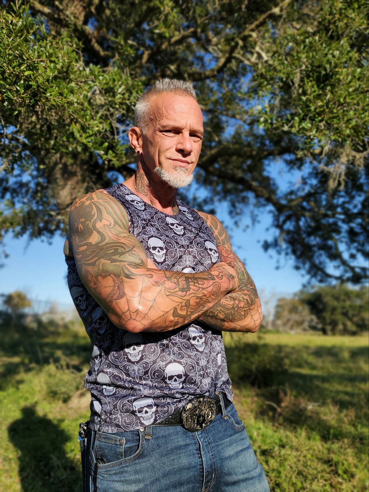 long term HIV AIDS survivor advocate educator activist Bob Bowers tattoos sleeves Houston Texas USA