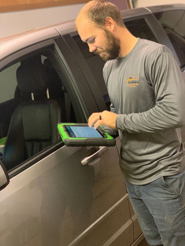 a technician using a calibration device