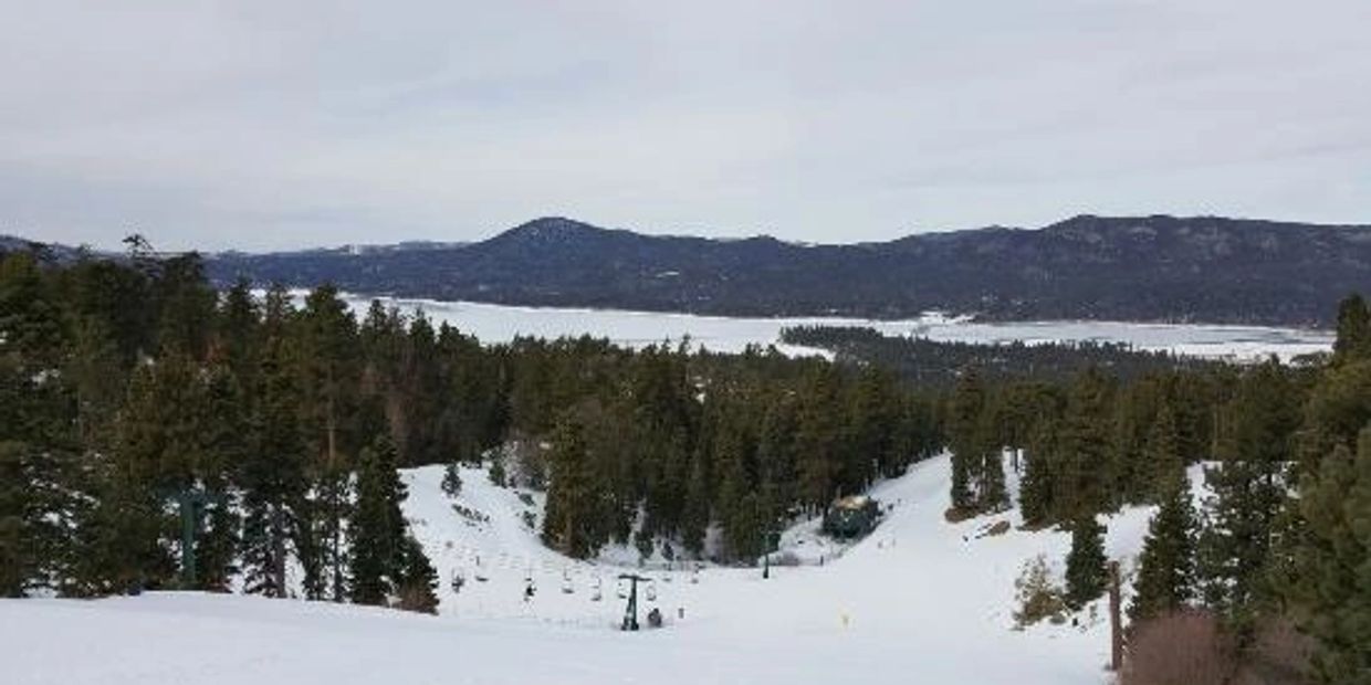 View from ski resort looking out on frozen lake 