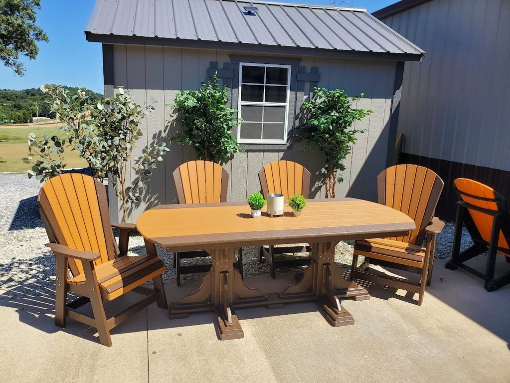 Standard-height 72-inch poly outdoor dining table with six patio chairs in brown and cedar