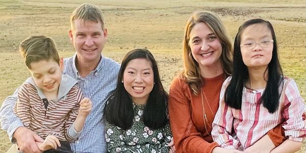 A family enjoying a mosquito and pest free yard.