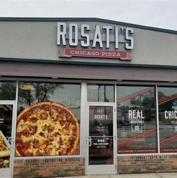 Exterior of Rosati's Chicago Pizza restaurant with large pizza image on window.