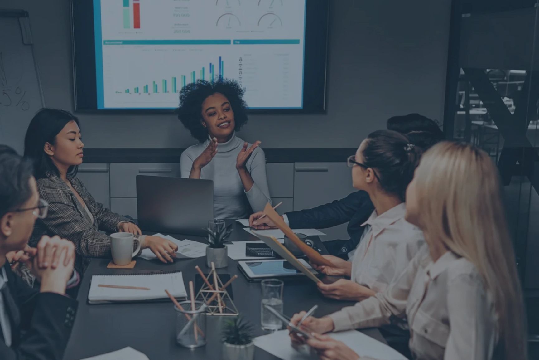 A team collaborating on competitive intelligence project to build commercial growth