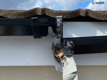 Broken roof gutter