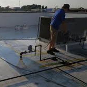 Commercial roof pressure washing