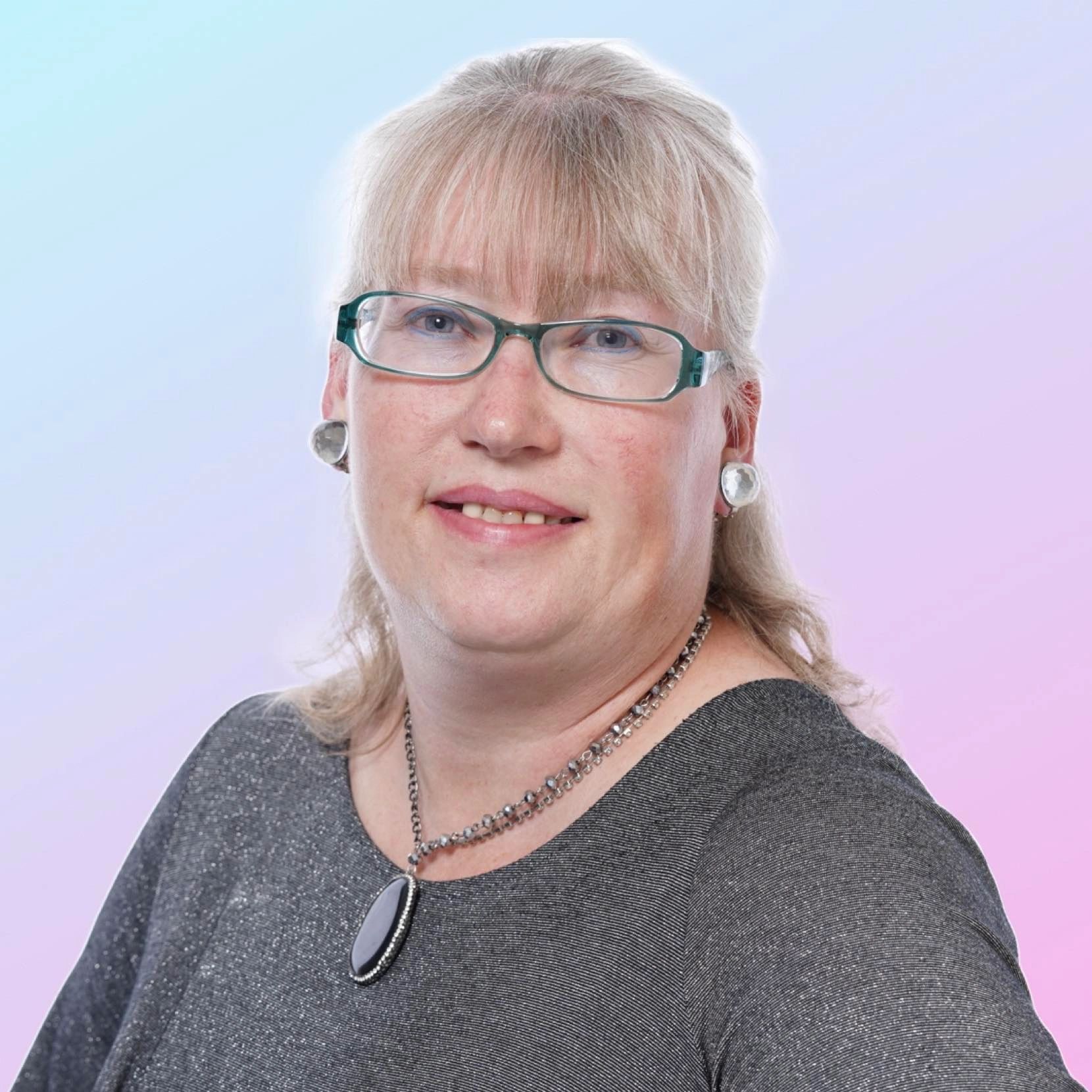 Head shot of Allison Almond, with a pink fading to blue background.