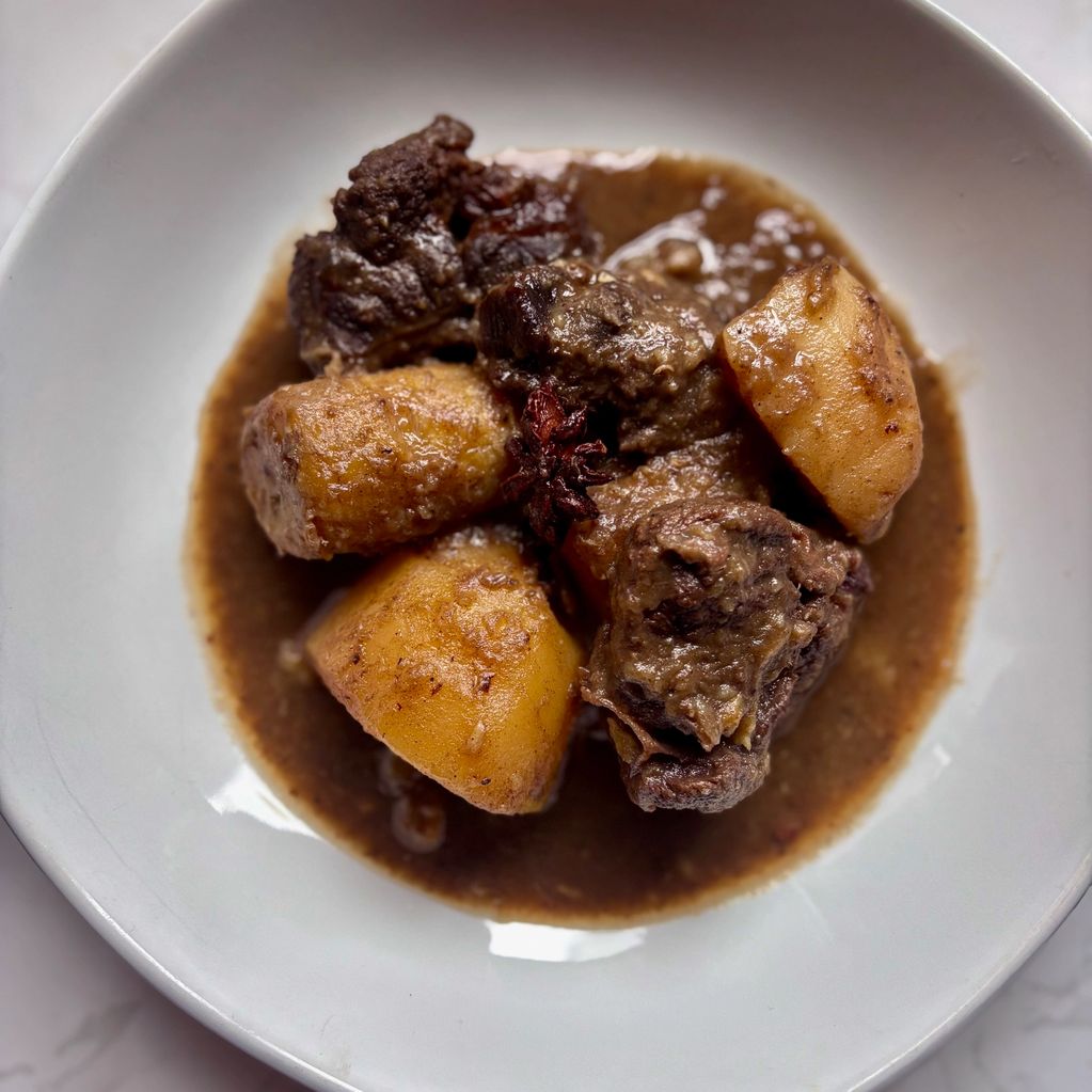 Slow-cooked beef, plantain, parsnip and potato stew 