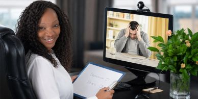 Therapist conducting an online counseling session.