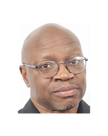 Close-up portrait of a bald man wearing glasses with a neutral expression.