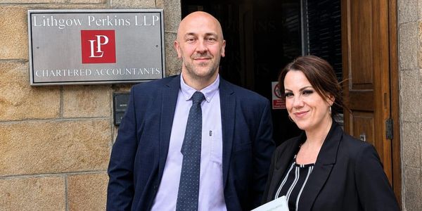 probate accountants Stuart and Julie outside the LP Probate Services office in Harrogate