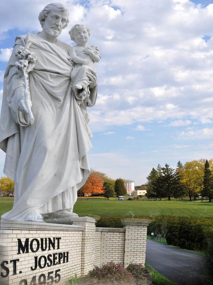 Statue of St. Joseph holding baby Jesus at Mount St. Joseph.
