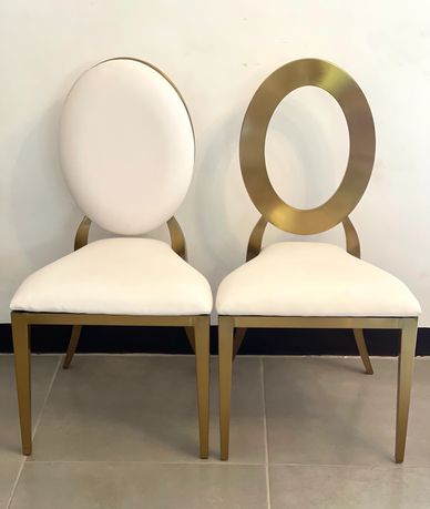 Silla Givenchi color dorado con óvalo blanco y abierto.Facil de combinar 
150 unida