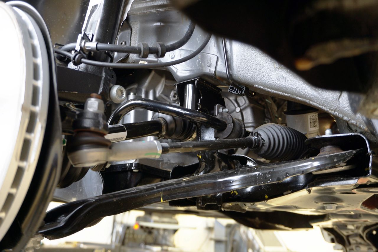 Check steering and front suspension components