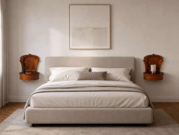 Minimalist bedroom with beige tones and vintage wooden wall shelves.
