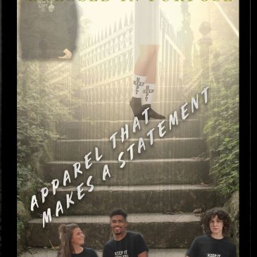 Three people wearing "Keep It" apparel sit on stairs, with a mysterious figure in heels above them.