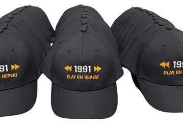 Custom embroidered hats showcasing high-quality logo embroidery by Durham Shirts