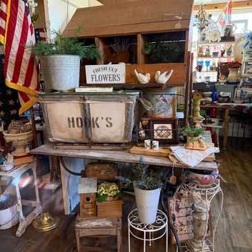 Vintage milk cans and rustic decor in a charming country store.