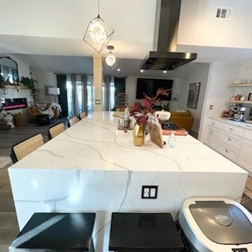 granite kitchen island, exhaust fan addition, remodeled open space