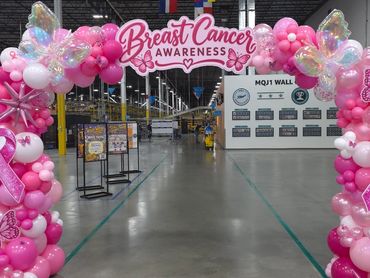 Pink breast cancer awareness balloon wall with ribbon, Ascension St. Vincent