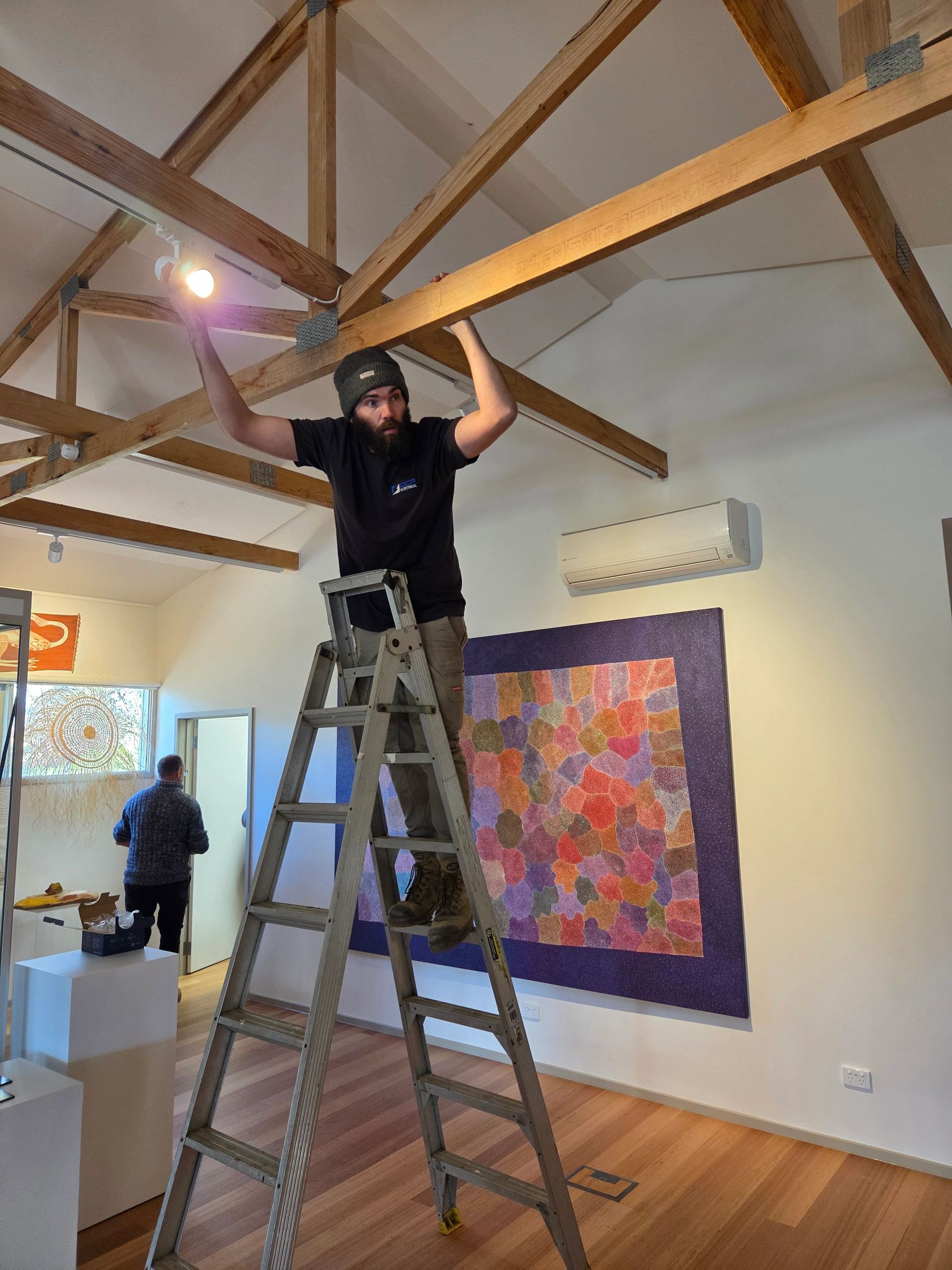 Electrician in Chirnside Park installing lighting – DCP Electrical, licensed local electricians.