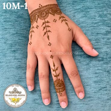Elegant henna design on hand featuring floral and vine patterns.