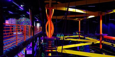 Indoor Ropes course high above the mini-golf course.