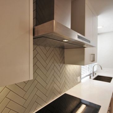 Herringbone tile backsplash