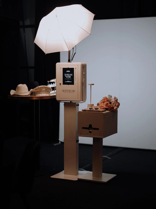 Modern White Photo Booth Set Up. Image captured by MEOWedding