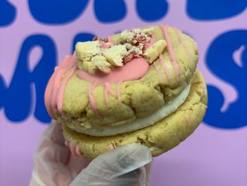 Jammy Dodger inspired cookie sandwich with white chocolate & raspberry jam.