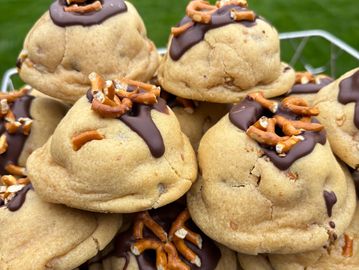 Salted caramel & pretzel NYC stuffed cookie with milk chocolate.