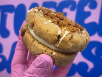 Biscoff inspired cookie sandwich with white chocolate filling & runny Biscoff.