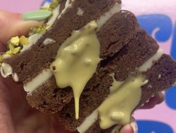 Double chocolate cookie sandwich with pistachio & white chocolate