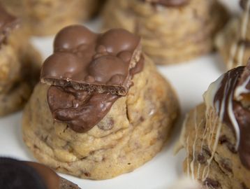 Malteser cookie dough. Stuffed with KitKat Chunky & Cadbury spread. Topped with Malteser chocolate