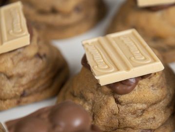 Mars Bar cookie dough. Stuffed with runny caramel. Topped with milk chocolate & Caramac pieces