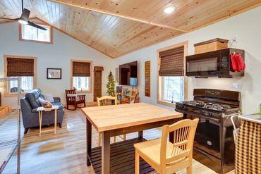 Rustic dining corner in a log cabin with natural wood textures