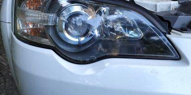 Garage Auto Detailing completed Headlight restoration by sanding, polishing, and applying ceramic co